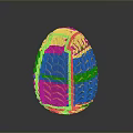 Colorful Scaled Egg Shaped Object With Yellow Green Orange And Blue Textured Surface