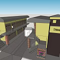Multi Story Industrial Building Exterior Featuring Yellow Brown Garage Doors White Truck And Person