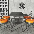 Modern Dining Table Set With Black Square Table Orange Padded Chairs And Metal Legs