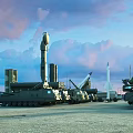 Military Tank With Missile Launchers And Rockets In Open Field Under Cloudy Sky