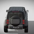 Grey Land Rover Defender SUV With Black Roof And UK License Plate