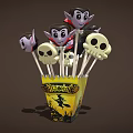 Halloween Themed Lollipops Featuring Vampire And Skull Heads In Yellow Packaging