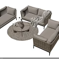 Beige Wicker Outdoor Sofa Set With Round Coffee Table Throw Blanket And Woven Rug