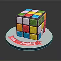 Rubik's Cube Shaped Birthday Cake With Colorful Squares Red Ribbon And Happy Birthday Message