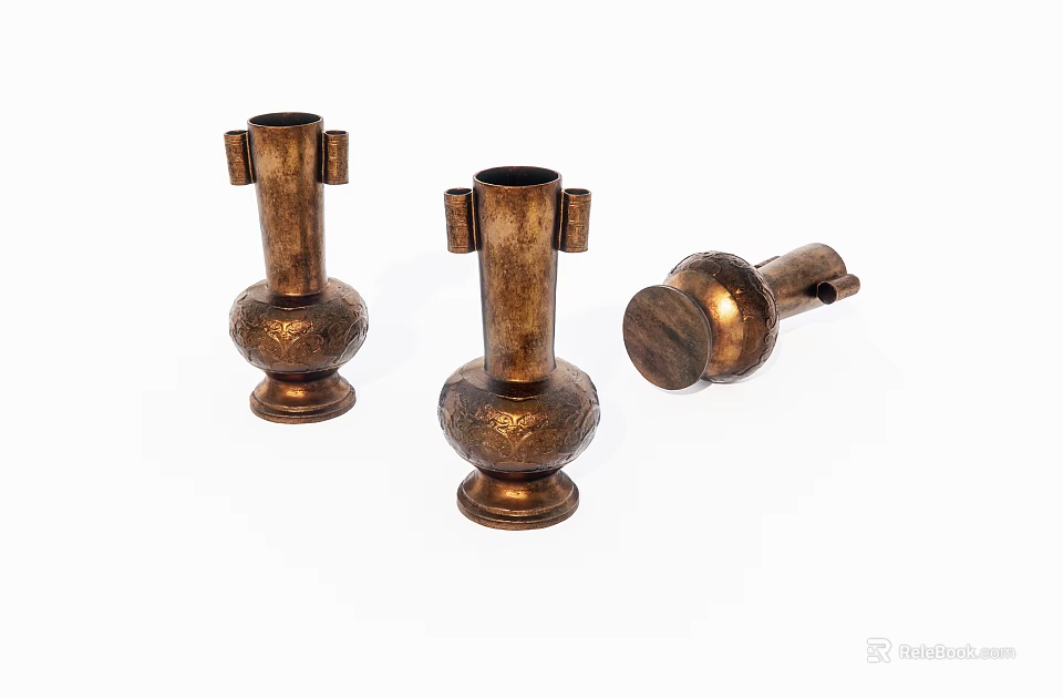 Three Piece Brass Vase Shaped Decorative Ornament Set With Carved Patterns 3d model 