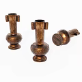 Three Piece Brass Vase Shaped Decorative Ornament Set With Carved Patterns