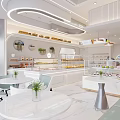 Modern Dessert Shop Interior With White Tables Displays And Greenery