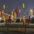 Red and Yellow Lanterns Hanging on Trees at Night with Decorative String Lights 3d model