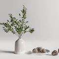 White Ceramic Vase With Green Branches And Pine Cones On White Plate