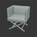 Modern Light Gray Armchair With Crossed Metal Legs And Upholstered Seat
