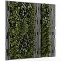 Green Living Wall With Vertical Slats And Various Plants
