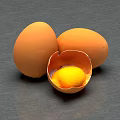 Fresh Chicken Eggs With One Cracked Shell And Exposed Yolk On Gray Surface 3d model