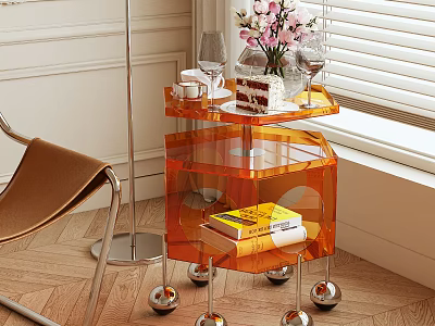 Orange Acrylic Decorative Side Table With Wheels Flowers Wine Glasses Cake And Books 3d model