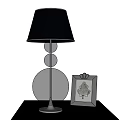 Modern Table Lamp with Dark Blue Lampshade Transparent Glass Base Beside Silver Leaf Pattern Frame 3d model