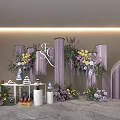 Elegant Floral Display With Purple Yellow Flowers Hanging Decorations Letter Ornaments And Dessert Table