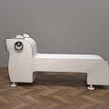 Yellow Animal Shaped Public Chair With Ears Eyes And Wheels On Wooden Floor