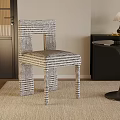 Modern Black And White Striped Dining Chair In Living Room With Rug And Side Table