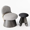 Gray Upholstered Sofa Stool With Wooden Base And Black Wooden Stool Featuring Hole Design
