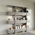 Modern Home Bookshelf With Layered Shelves Drawers Books And Decorative Items