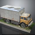 Old Yellow Truck Model With Rusty Body And White Roof On Grass And Pavement Base