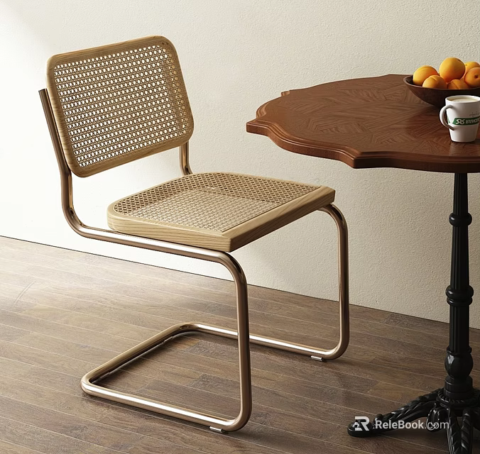 Modern Woven Dining Chair With Metal Frame And Wooden Table With Oranges 3d model 