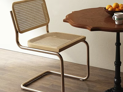 Modern Woven Dining Chair With Metal Frame And Wooden Table With Oranges 3d model