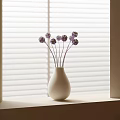 Purple Flowers In White Vase On Window Sill With Natural Light Blinds
