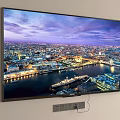 Wall Mounted TV Showing Stunning City Night View With River And Illuminated Buildings