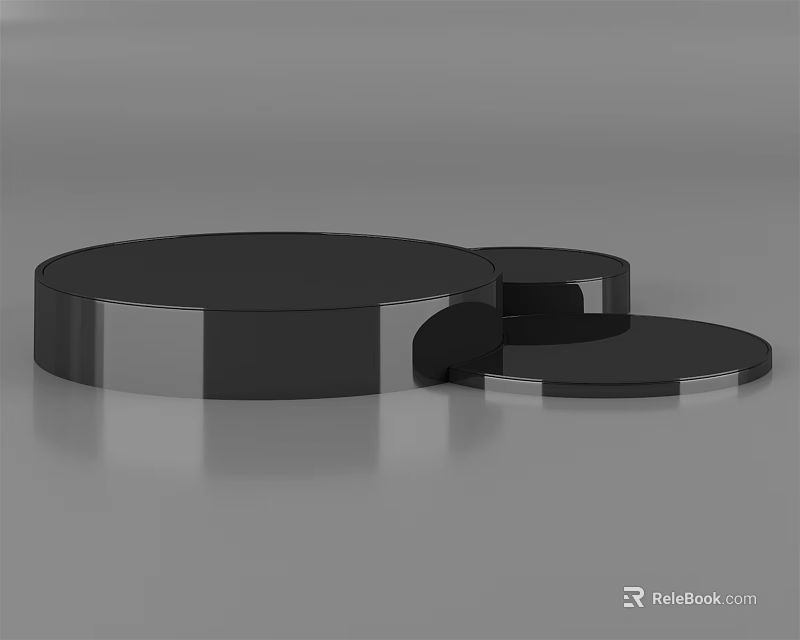 Three Black Round Coffee Tables With Silver Trim And Smooth Surface 3d model