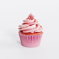Delicious Pink Cupcake With Swirled Pink Frosting And Gold Sprinkles In Pink Liner