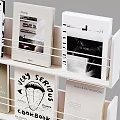 Books and Magazines Neatly Arranged on Shelves with Various Cover Designs
