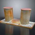 Industrial Equipment With Two Rusted Cylindrical Structures Mounted On Metal Base