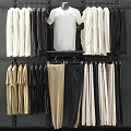 Hanging Clothes In Various Colors With Tops And Pants Neatly Displayed