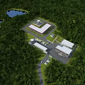 Industrial Factory Surrounded by Lush Green Forest and Lake with Modern Buildings Parking and Roads