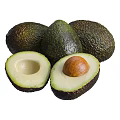 Ripe Whole and Halved Avocado with Creamy Flesh and Brown Seed