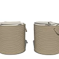 Woven Beige Storage Baskets With Handles Holding White Towels For Organization