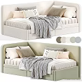 Cozy Kids Bed With Upholstered Headboard Multiple Pillows And Soft Blanket In Beige White Tones