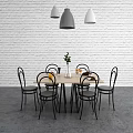 Modern Dining Table Set with Black Chairs Light Wood Vase Green Plant and Pendant Lights