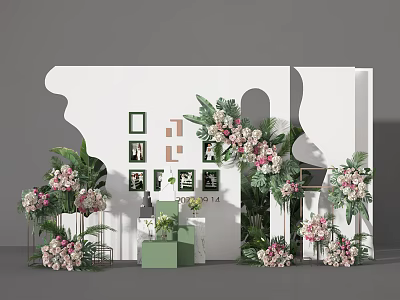 Decorative Wall Display With Floral Arrangements Photo Frames And Green Plants 3d model