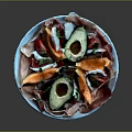 Fresh Avocado Halves With Prosciutto Slices Papaya Chunks And Fresh Herbs On Blue Plate