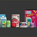 Assorted Beverages Including Milk Canned Drinks Juice With Colorful Packaging And Cup