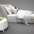 Cozy Double Bed With Gray Headboard Pillows Blanket And Bedside Table With Books Blue Bowl