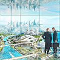 Modern Exhibition Hall Showcasing Futuristic City Model With Glass Walls And Visitors