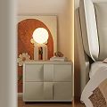Modern Beige Nightstand With Round Lamp Books And Bedside Artwork