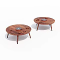 Round Wooden Dining Tables With Small Plates And Decorative Items On Slender Legs 3d model