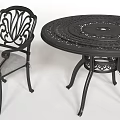 Outdoor Table with Ornate Metal Design and Matching Chairs Gray Cushions