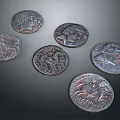 Ancient Metal Coins Featuring Sculpted Portraits And Detailed Historical Engravings