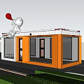 Two Story Orange And White Container Building With Lawn Steps And White Bear On Roof