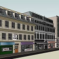 Traditional And Modern Commercial Street With Live Music Laundrette Shop Fronts And Signs