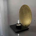 Decorative Ornament Combination with Lit Candle and Golden Circular Moon Texture on Black Square Base
